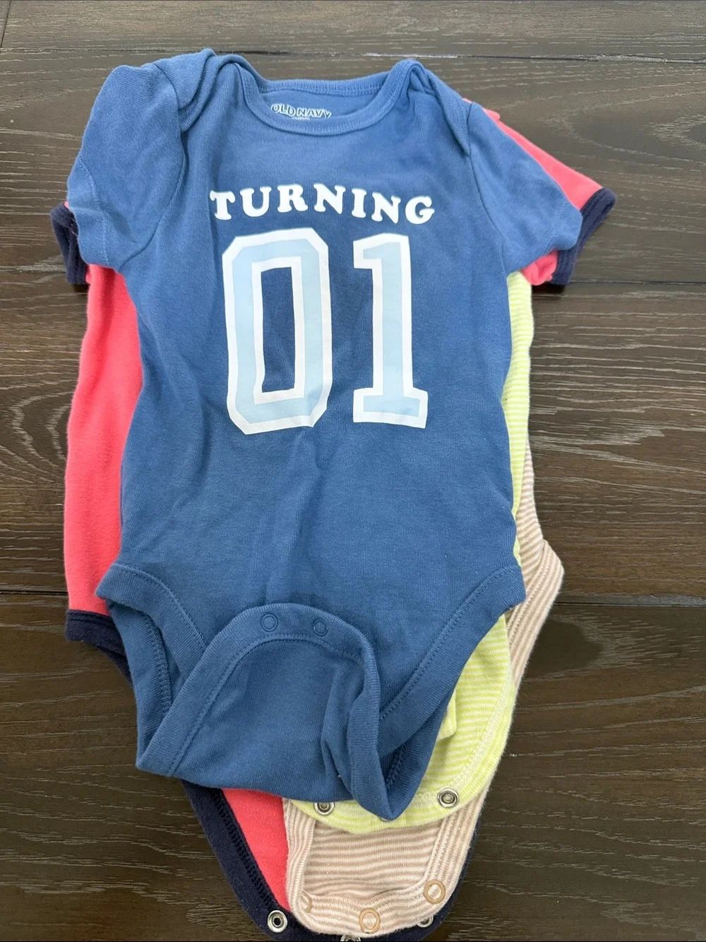 4 baby onesies 12-18 months different brands bodysuits blue green red brown